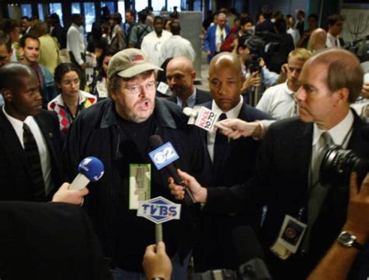 Denver Reporter Confronts Michael Moore about $50 Million Net Worth