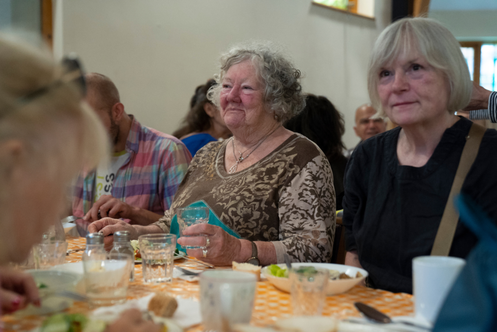 People eating at FoodCycle community meal